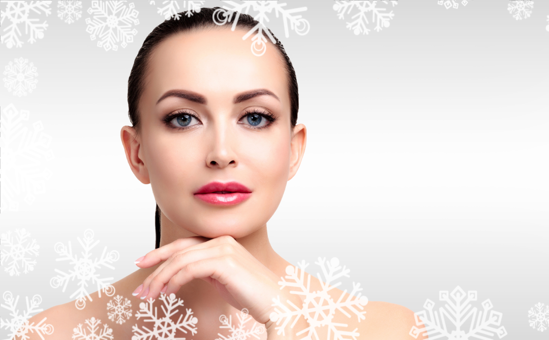 A woman with flawless, glowing skin against a snowy background after a medspa Botox session.